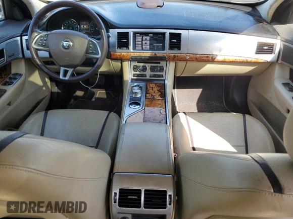 2015 Jaguar XF V6 Portfolio with VIN SAJWJ0FFXF8U60040, listed as a Copart auction lot 52912695 with 112,618 mi miles and Salvage Title. Bid and sale history available at carsss.com. Image 8.