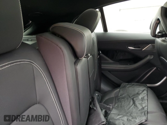 2020 Jaguar I-Pace HSE z VIN SADHD2S19L1F85465, wystawiony jako Copart lot #38365423 z przebiegiem Nie podano mil oraz . Historia ofert i sprzedaży dostępna na DreamBid. Obrazek 11.