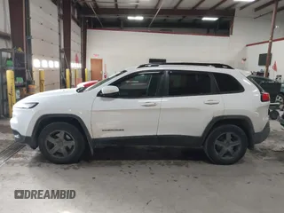 2014 Jeep Cherokee Latitude with VIN 1C4PJMCS5EW288909, listed as a IAAI auction lot 41531117 with 108,971 mi miles and . Bid and sale history available at carsss.com. Image 14.