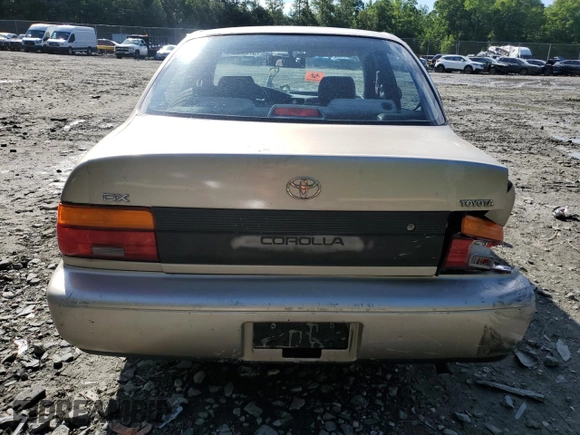 1995 Toyota Corolla DX with VIN 2T1AE09B0SC098739, listed as a Copart auction lot 57653205 with 154,226 mi miles and Salvage title. Bid and sale history available at DreamBid. Image 6.