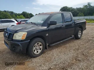 2004 Nissan Titan SE z VIN 1N6AA07A34N548712, wystawiony jako Copart lot #64670235 z przebiegiem 298 784 mil mil oraz Czysty tytuł • Clean title. Historia ofert i sprzedaży dostępna na DreamBid. Obrazek 1.