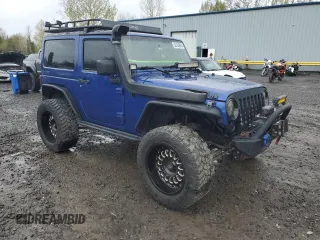 2009 Jeep Wrangler X with VIN 1J4FA24179L700884, listed as a Copart auction lot 52194055 with 96,189 mi miles and Salvage Title. Bid and sale history available at DreamBid. Image 4.