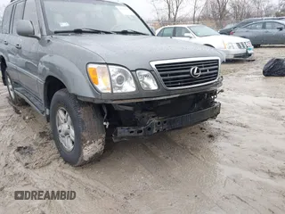 2000 Lexus LX 470 z VIN JT6HT00W8Y0092556, wystawiony jako IAAI lot #41727615 z przebiegiem 156 262 mil mil oraz . Historia ofert i sprzedaży dostępna na DreamBid. Obrazek 13.