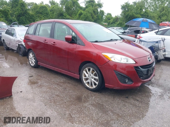 2012 Mazda 5 Grand Touring with VIN JM1CW2DL8C0142628, listed as a IAAI auction lot 42350676 with 84,764 mi miles and . Bid and sale history available at DreamBid. Image 1.