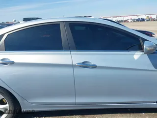 2013 Hyundai Sonata SE with VIN 5NPEC4AC9DH647065, listed as a IAAI auction lot 41636762 with 148,669 mi miles. Bid and sale history available at carsss.com. Image 14.