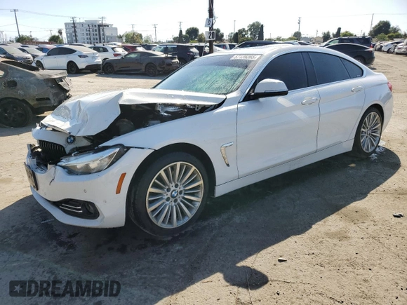 2015 BMW 4 Series 428i with VIN WBA4A9C58FGL85220, listed as a Copart auction lot 57128265 with 115,257 mi miles and Salvage title. Bid and sale history available at DreamBid. Image 1.