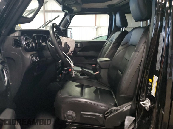 2023 Jeep Wrangler Sahara with VIN 1C4HJXEG3PW595576, listed as a Copart auction lot 64681745 with 32,843 mi miles and Salvage title. Bid and sale history available at DreamBid. Image 7.