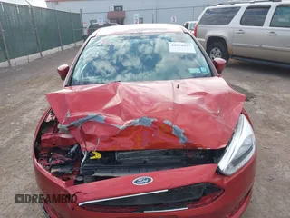2018 Ford Focus SE with VIN 1FADP3FE6JL318552, listed as a IAAI auction lot 42090857 with 81,624 mi miles. Bid and sale history available at carsss.com. Image 12.
