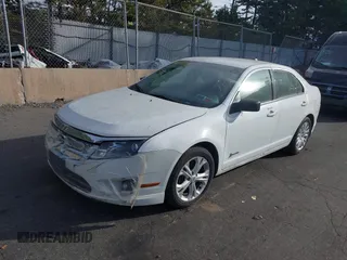 2012 Ford Fusion Hybrid with VIN 3FADP0L31CR380494, listed as a IAAI auction lot 40411832 with 81,452 mi miles and . Bid and sale history available at DreamBid. Image 2.