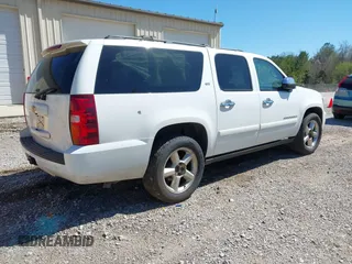 2008 Chevrolet Suburban LTZ with VIN 3GNFC16J08G157677, listed as a IAAI auction lot 41810860 with 267,526 mi miles and . Bid and sale history available at DreamBid. Image 4.