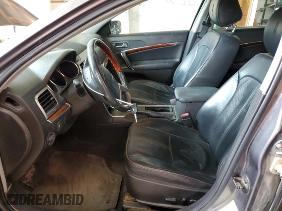 2011 Lincoln MKZ with VIN 3LNHL2JC8BR765423, listed as a Copart auction lot 62016595 with 144,842 mi miles and Salvage title. Bid and sale history available at DreamBid. Image 7.