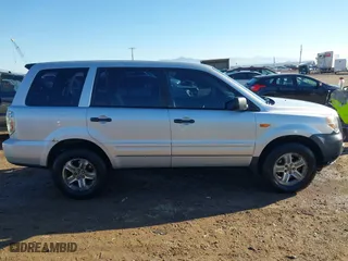 2006 Honda Pilot LX with VIN 2HKYF18156H556689, listed as a IAAI auction lot 40792236 with 273,856 mi miles. Bid and sale history available at carsss.com. Image 14.