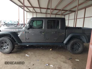 2022 Jeep Gladiator Mojave z VIN 1C6JJTEG8NL182360, wystawiony jako IAAI lot #42194516 z przebiegiem 67 658 mil mil oraz . Historia ofert i sprzedaży dostępna na DreamBid. Obrazek 14.