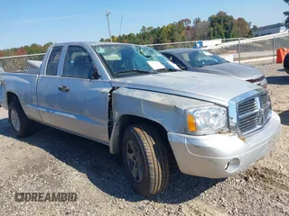 2006 Dodge Dakota SLT with VIN 1D7HE42K56S592749, listed as a IAAI auction lot 40685982 with 148,270 mi miles and . Bid and sale history available at DreamBid. Image 1.
