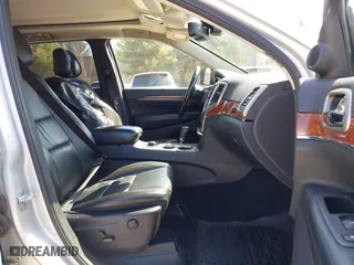 2011 Jeep Grand Cherokee Limited with VIN 1J4RR5GG8BC556064, listed as a IAAI auction lot 42014688 with 151,706 mi miles. Bid and sale history available at carsss.com. Image 5.