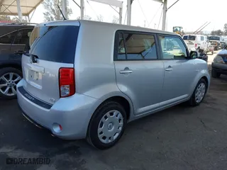 2015 Scion xB with VIN JTLZE4FE4FJ076444, listed as a IAAI auction lot 42025005 with 76,918 mi miles. Bid and sale history available at carsss.com. Image 4.