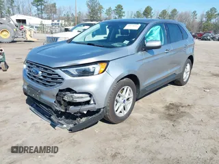 2022 Ford Edge SEL z VIN 2FMPK4J91NBA64868, wystawiony jako IAAI lot #38954615 z przebiegiem 33 911 mil mil oraz . Historia ofert i sprzedaży dostępna na DreamBid. Obrazek 17.