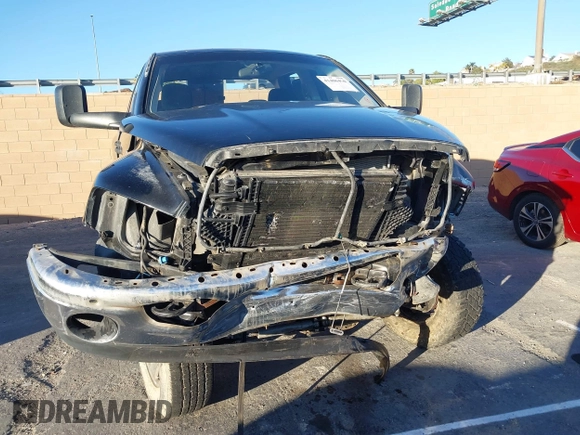 2005 Dodge 2500 SLT with VIN 3D7KS28C15G805401, listed as a IAAI auction lot 41406490 with 222,717 mi miles and . Bid and sale history available at DreamBid. Image 13.