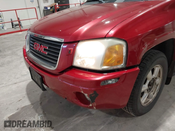 2005 GMC Envoy SLT with VIN 1GKDT13S352324863, listed as a IAAI auction lot 41707649 with 247,326 mi miles. Bid and sale history available at carsss.com. Image 6.