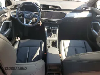 2020 Audi Q3 Premium with VIN WA1AECF30L1023652, listed as a Copart auction lot 57148915 with 69,621 mi miles and Salvage title. Bid and sale history available at DreamBid. Image 8.