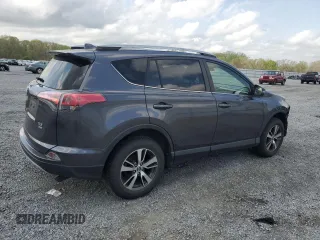 2018 Toyota RAV4 XLE with VIN JTMRFREV2JJ215776, listed as a Copart auction lot 51745205 with 52,009 mi miles and Salvage Title. Bid and sale history available at DreamBid. Image 3.