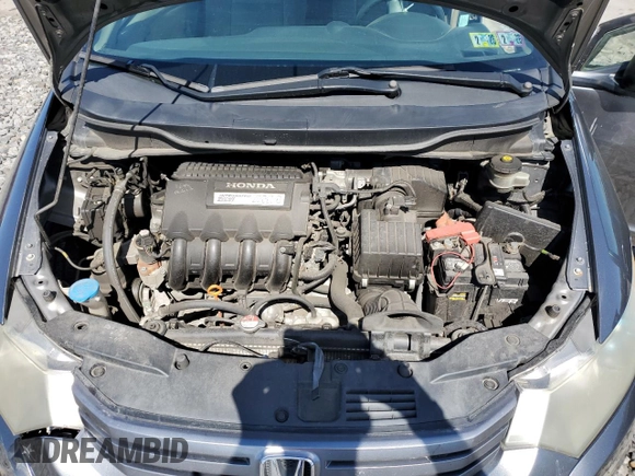 2010 Honda Insight LX z VIN JHMZE2H59AS000085, wystawiony jako Copart lot #54932975 z przebiegiem 218 961 mil mil oraz Szkoda całkowita • Salvage title. Historia ofert i sprzedaży dostępna na DreamBid. Obrazek 11.