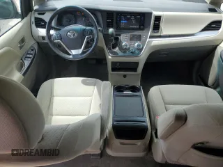 2016 Toyota Sienna LE with VIN 5TDJK3DC3GS131175, listed as a Copart auction lot 52520595 with 107,001 mi miles and Salvage Title. Bid and sale history available at carsss.com. Image 8.