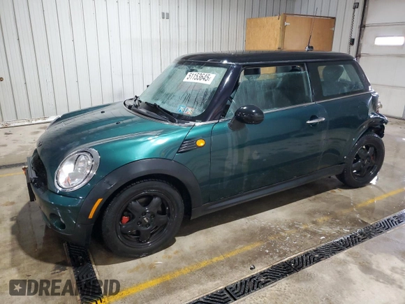 2008 MINI Hardtop with VIN WMWMF33558TT66729, listed as a Copart auction lot 51153645 with 127,357 mi miles and Salvage Title. Bid and sale history available at DreamBid. Image 1.