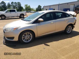 2017 Ford Focus SE with VIN 1FADP3F26HL295581, listed as a Copart auction lot 52158745 with 104,453 mi miles and Salvage title. Bid and sale history available at DreamBid. Image 1.