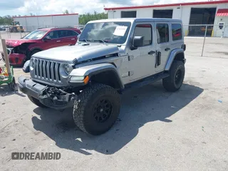 2021 Jeep Wrangler Unlimited Sahara with VIN 1C4HJXEN9MW637288, listed as a IAAI auction lot 42553459 with 39,362 mi miles and . Bid and sale history available at DreamBid. Image 2.