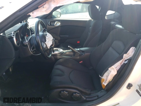 2013 Nissan 370Z with VIN JN1AZ4EH4DM384057, listed as a Copart auction lot 73185154 with 103,939 mi miles and Clean Title. Bid and sale history available at carsss.com. Image 7.