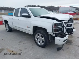 2015 Chevrolet Silverado 1500 LT with VIN 1GCVKREC7FZ421032, listed as a IAAI auction lot 41520494 with 184,880 mi miles. Bid and sale history available at carsss.com. Image 1.