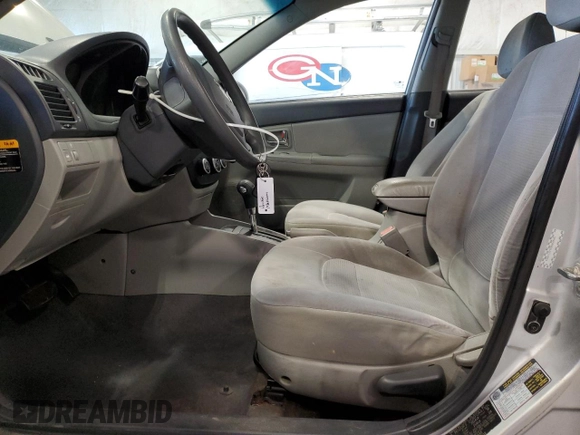 2009 Kia Spectra EX with VIN KNAFE221X95650545, listed as a Copart auction lot 74496974 with 203,752 mi miles and Non Repairable. Bid and sale history available at carsss.com. Image 7.
