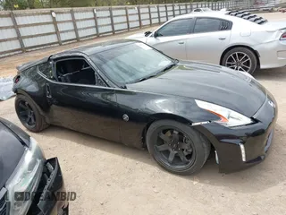 2016 Nissan 370Z with VIN JN1AZ4EHXGM935774, listed as a IAAI auction lot 41976743 with 66,979 mi miles. Bid and sale history available at carsss.com. Image 13.