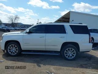 2015 GMC Yukon Denali with VIN 1GKS1CKJ5FR285199, listed as a IAAI auction lot 41763187 with 135,265 mi miles. Bid and sale history available at carsss.com. Image 14.