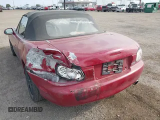 1999 Mazda MX-5 Miata z VIN JM1NB3531X0129508, wystawiony jako IAAI lot #41601347 z przebiegiem 156 702 mil mil oraz . Historia ofert i sprzedaży dostępna na DreamBid. Obrazek 3.