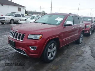 2014 Jeep Grand Cherokee Overland with VIN 1C4RJFCG9EC299235, listed as a IAAI auction lot 41670065 with 108,589 mi miles and . Bid and sale history available at DreamBid. Image 21.