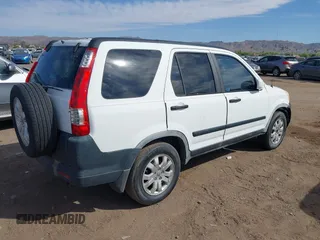 2005 Honda CR-V EX with VIN JHLRD78855C019859, listed as a IAAI auction lot 42150979 with 247,364 mi miles. Bid and sale history available at carsss.com. Image 4.