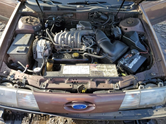1989 Ford Taurus GL with VIN 1FABP52U1KA299938, listed as a Copart auction lot 86684144 with 52,675 mi miles and Salvage Title. Bid and sale history available at carsss.com. Image 11.