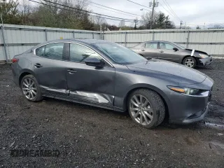 2022 Mazda 3 Premium with VIN 3MZBPADL3NM311549, listed as a Copart auction lot 51748215 with 16,600 mi miles and Salvage Title. Bid and sale history available at DreamBid. Image 4.