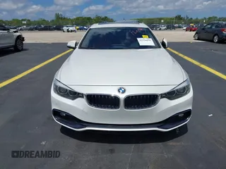 2018 BMW 4 Series 430i with VIN WBA4J1C5XJBG78451, listed as a IAAI auction lot 42256036 with 103,289 mi miles and . Bid and sale history available at DreamBid. Image 6.