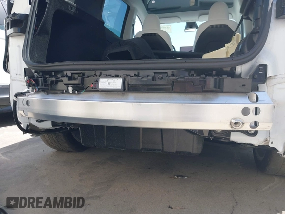 2024 Tesla Model Y with VIN 7SAYGDED2RF017448, listed as a IAAI auction lot 41597056 with 9,702 mi miles and . Bid and sale history available at DreamBid. Image 6.