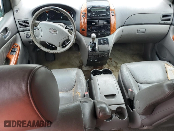 2012 Toyota Sienna XLE AAS with VIN 5TDYK3DC6CS275537, listed as a Copart auction lot 66040605 with 135,148 mi miles and Clean title. Bid and sale history available at DreamBid. Image 8.