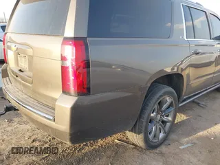 2015 Chevrolet Suburban LTZ with VIN 1GNSKKKC1FR628182, listed as a IAAI auction lot 41801391 with Not Provided miles and . Bid and sale history available at DreamBid. Image 4.