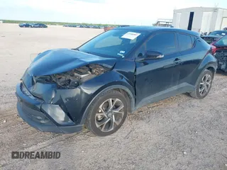 2018 Toyota C-HR XLE with VIN JTNKHMBX6J1007058, listed as a IAAI auction lot 42100587 with 71,725 mi miles and . Bid and sale history available at DreamBid. Image 18.