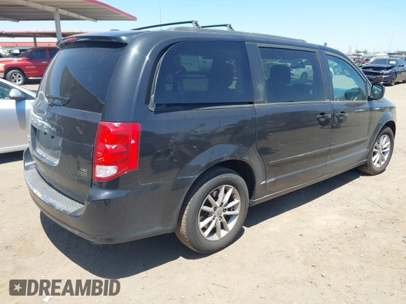 2014 Dodge Grand Caravan SXT with VIN 2C4RDGCG7ER265931, listed as a IAAI auction lot 42141644 with 205,968 mi miles and . Bid and sale history available at DreamBid. Image 4.