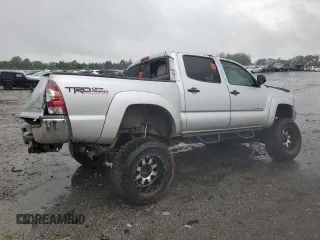 2013 Toyota Tacoma with VIN 5TFLU4EN8DX065656, listed as a Copart auction lot 63486165 with 185,018 mi miles and Salvage title. Bid and sale history available at DreamBid. Image 3.