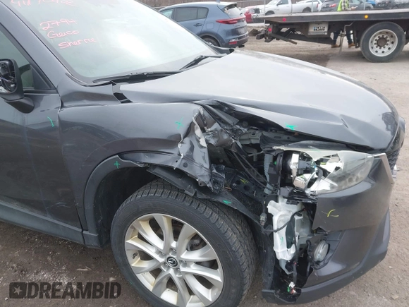 2014 Mazda CX-5 Grand Touring with VIN JM3KE4DY4E0343863, listed as a IAAI auction lot 41770402 with 117,615 mi miles. Bid and sale history available at carsss.com. Image 6.
