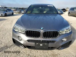 2015 BMW X6 xDrive35i with VIN 5UXKU2C58F0F96503, listed as a Copart auction lot 70099462 with 77,940 mi miles. Bid and sale history available at carsss.com. Image 5.