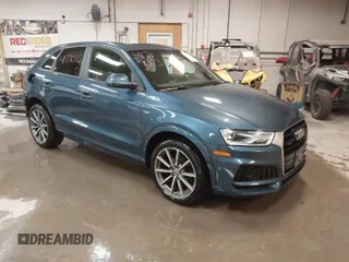 2018 Audi Q3 Premium with VIN WA1ECCFS4JR027295, listed as a IAAI auction lot 41719073 with 74,656 mi miles. Bid and sale history available at carsss.com. Image 1.